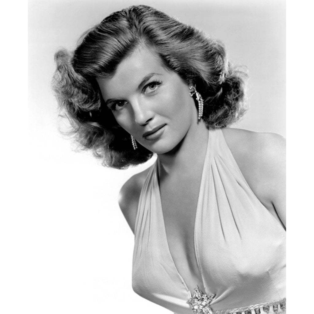 Bring your space to life with this unique Corinne Calvet artwork. This one-of-a-kind vintage photographic image has been faithfully reproduced on canvas and is sure to add a touch of glamour and retro sophistication to any home décor.